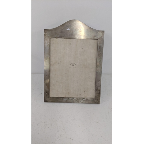 101 - Mappin & Webb silver frame, 35.5cm h x 24cm w
Location:10.1
If there is no condition report shown, p... 