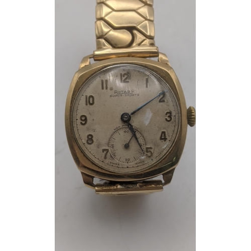 116 - A gent's 9ct yellow gold cased manual wind wristwatch (gold back 4.2g) on a gold plated expanding br... 