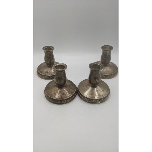 117 - Four sterling silver dwarf candlesticks, weighted Location:BWR
If there is no condition report shown... 