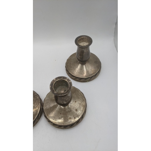 117 - Four sterling silver dwarf candlesticks, weighted Location:BWR
If there is no condition report shown... 