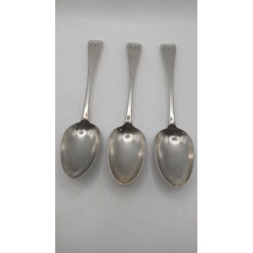 124 - A set of three silver serving spoons with engraved initials to the terminals hallmarked London 1839,... 