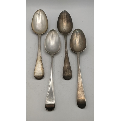 127 - Four silver serving spoons, all bearing different hallmarks, one example hallmarked London 1739 and ... 