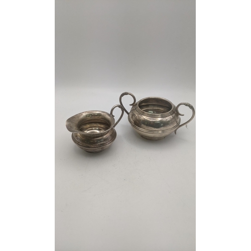 130 - An Alex Clark twin handled sugar bowl and cream jug, total weight 207g Location:
If there is no cond... 