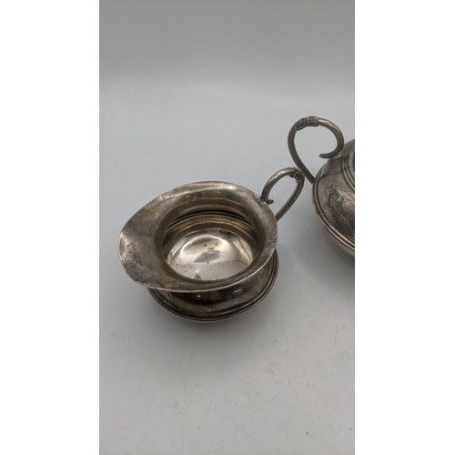 130 - An Alex Clark twin handled sugar bowl and cream jug, total weight 207g Location:RWB
If there is no c... 