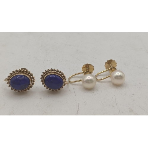 160 - Two pairs of 9ct yellow gold earrings to include a pair set with lapis lazuli, and the other set wit... 