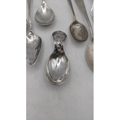 164 - A quantity of silver teaspoons and a decorative tea caddy spoon made by Oliver and Bower, hallmarked... 