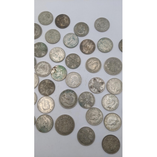 175 - A collection of 1920's/1946 British silver coinage to include one florins, two shillings, total weig... 