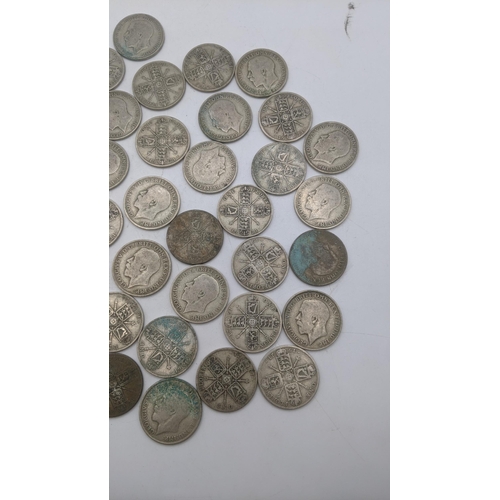 176 - A collection of 1920's/1940 British silver coinage to include florins, total weight 497g
Location: B... 