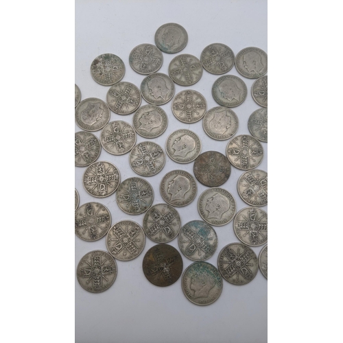 176 - A collection of 1920's/1940 British silver coinage to include florins, total weight 497g
Location: B... 