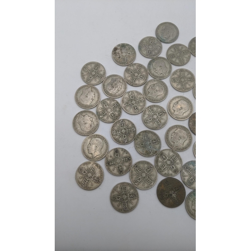 176 - A collection of 1920's/1940 British silver coinage to include florins, total weight 497g
Location: B... 