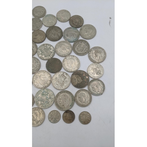 177 - A collection of 1920's/1940 British silver coinage to include half crowns and six pence 500.8g
Locat... 