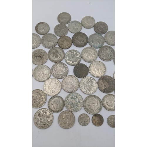 177 - A collection of 1920's/1940 British silver coinage to include half crowns and six pence 500.8g
Locat... 