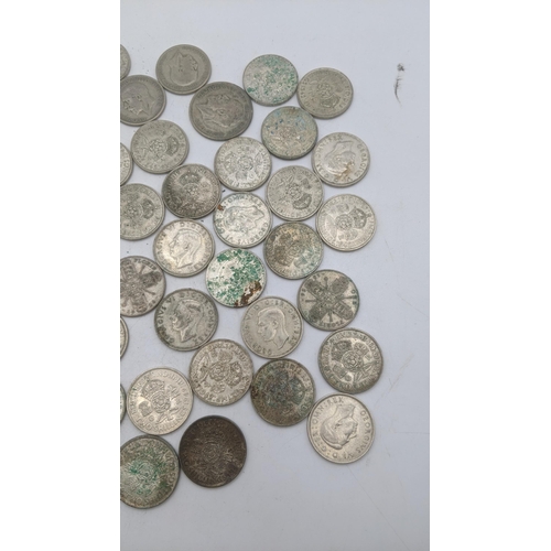 178 - A collection of 1920's/1946 British silver coinage to include Florins, two shillings 499g
Location: ... 