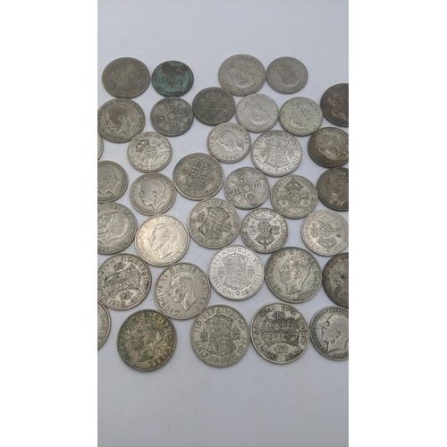 179 - A collection of 1920's/1946 British silver coinage to include half crowns and others, total weight 5... 