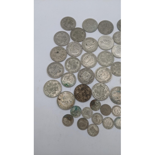 181 - A collection of 1920's/1946 British silver coinage to include Florins, six pence and half crowns, to... 