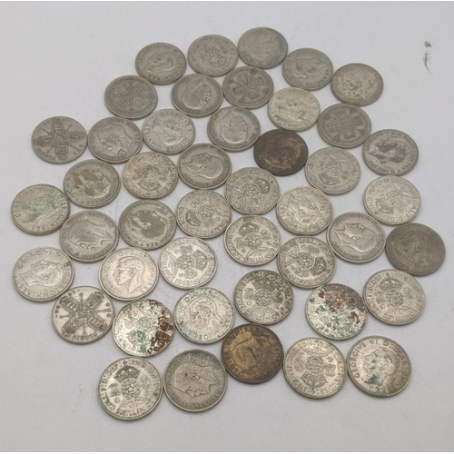 183 - A collection of 1920's/1946 British silver coinage to include two shillings and others, total weight... 