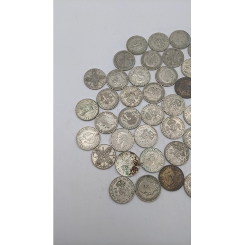 183 - A collection of 1920's/1946 British silver coinage to include two shillings and others, total weight... 