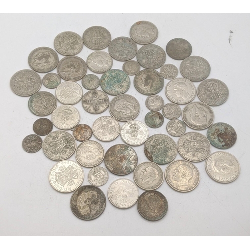 184 - A collection of 1920's/1946 British silver coinage to include two shillings and others, total weight... 