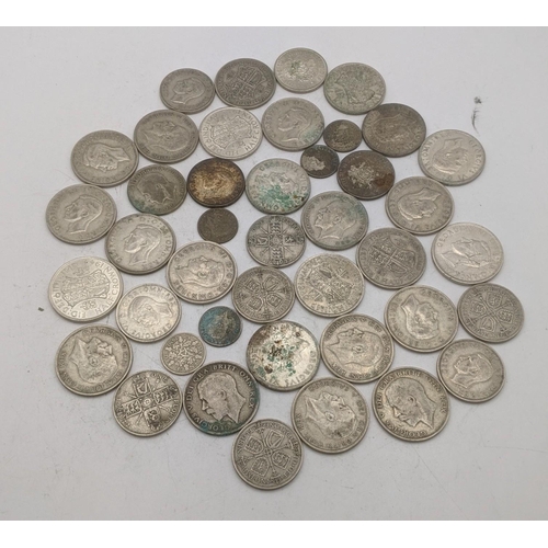 185 - A collection of 1920's/1946 British silver coinage to include Florins and others, total weight 499.1... 