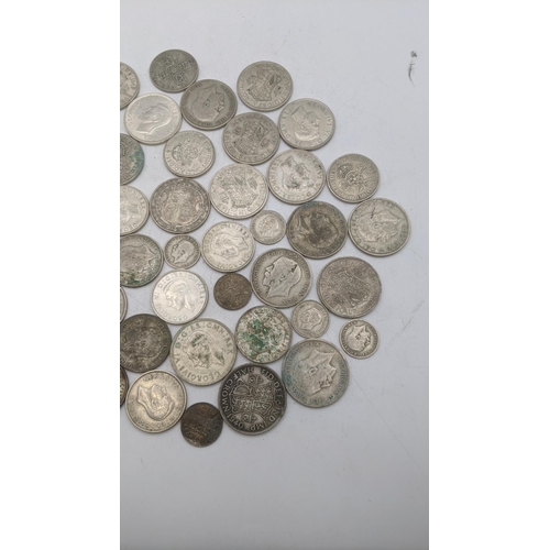 186 - A collection of 1920's/1946 British silver coinage to include six pence and others, total weight 499... 