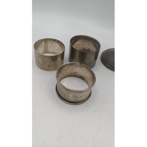 82 - Silver to include a goblet marked to Southgate County School, along with three napkin rings, total w... 