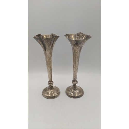 83 - A pair of silver trumpet shaped vases, weighted, hallmarked Birmingham 1905, 16.5cm h Location:R1.3
... 