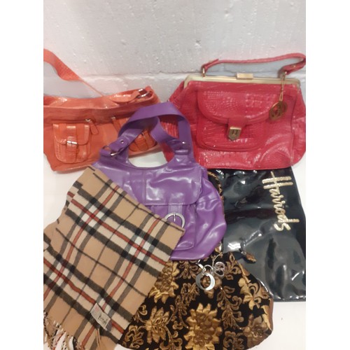 392 - A group of fashion bags to include a red Fortuna Valentino faux crocodile handbag A/F and a Harrods ... 