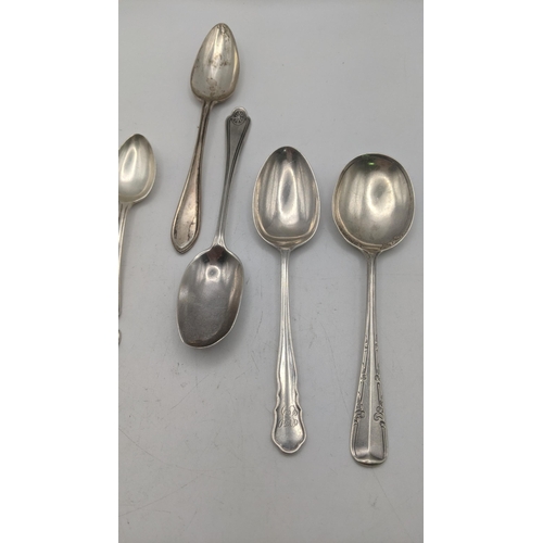 100 - A group of eight silver spoons to include a set of four teaspoons, hallmarked Birmingham 1913 and ot... 