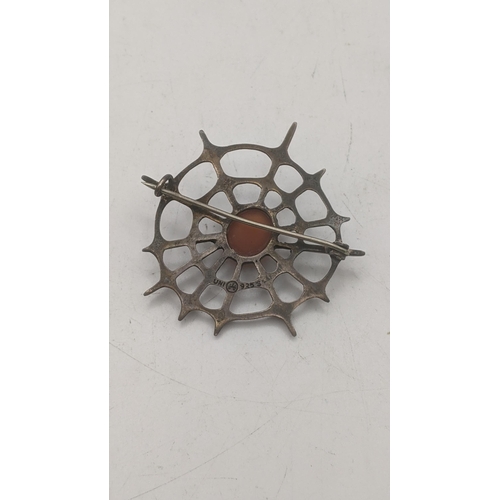 107 - A David Andersen Norway silver and orange cabochon spider's web brooch Location:CAB5
If there is no ... 