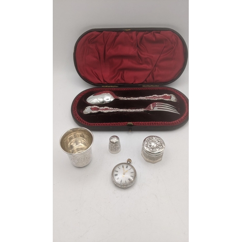 122 - Silver collectables to include an early 20th century open faced keyless pocket watch, along with a s... 