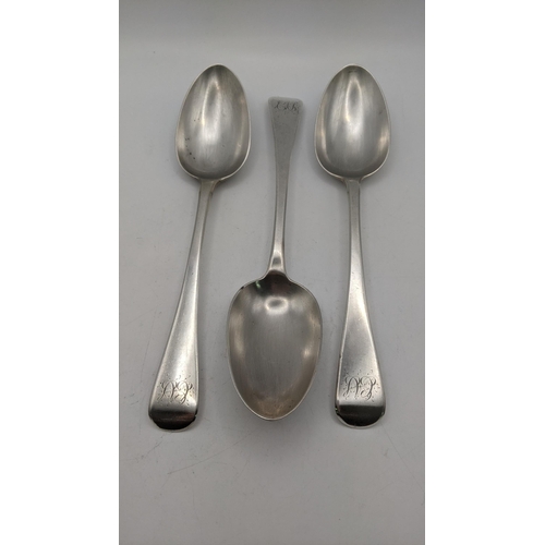 124 - A set of three silver serving spoons with engraved initials to the terminals hallmarked London 1839,... 