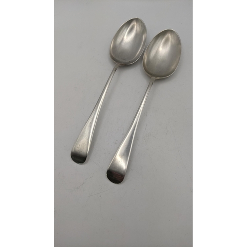 128 - A pair of Cooper Brothers and Sons silver serving spoons hallmarked Sheffield 1926, 105.9g Location:... 