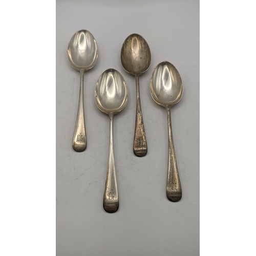 129 - Four Kemp Brothers silver tablespoons having engraved initial to the terminal, total weight 186.5g L... 