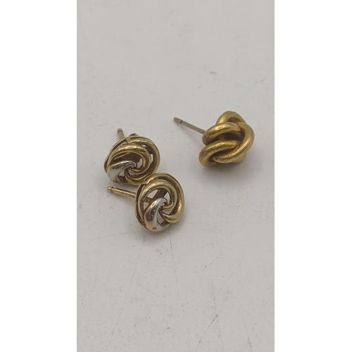 137 - A yellow gold knot style stud earring tested as 18ct gold 2.2g, together with a pair of 9ct gold stu... 