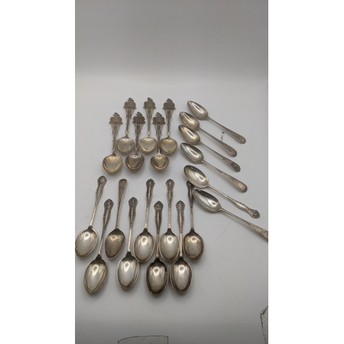 140 - Silver teaspoons to include a set of six Law and Order collector's spoons and others, total weight 2... 