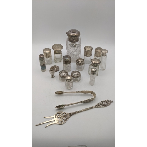 153 - A mixed lot of silver and crystal cut glass scent bottles and dressing table jars, together with a p... 