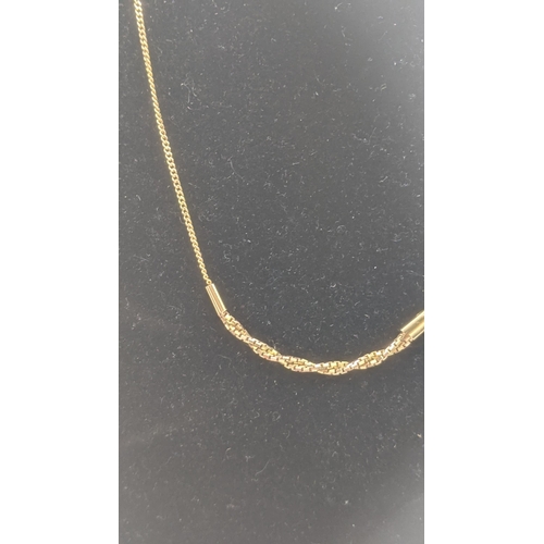 158 - A 14ct yellow gold necklace having a rope twist style segment, 3g
Location:CAB5
If there is no condi... 