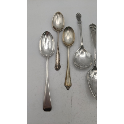 164 - A quantity of silver teaspoons and a decorative tea caddy spoon made by Oliver and Bower, hallmarked... 