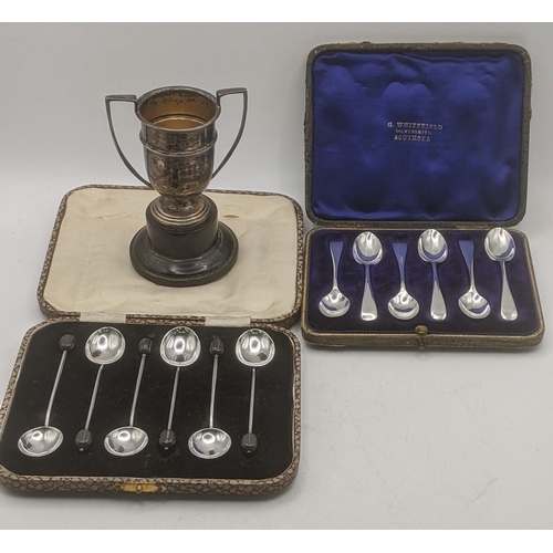 167 - Two sets of six silver coffee spoons to include one set hallmarked London 1909, both in fitted cases... 