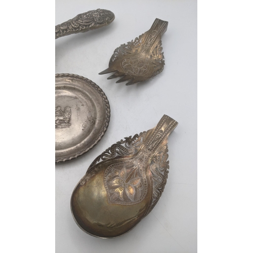 170 - Silver and white metal to include a floral embossed hand brush A/F, together with white metal Ethiop... 