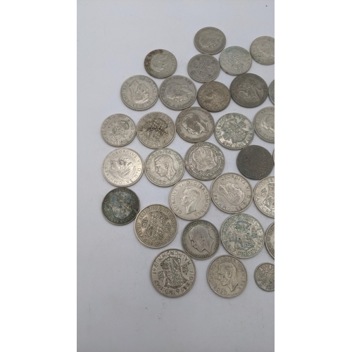 177 - A collection of 1920's/1940 British silver coinage to include half crowns and six pence 500.8g
Locat... 