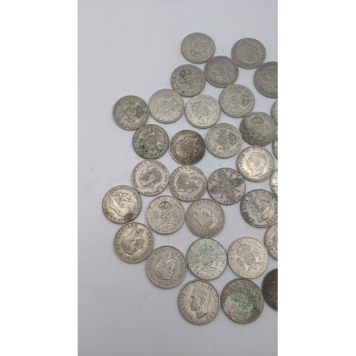 178 - A collection of 1920's/1946 British silver coinage to include Florins, two shillings 499g
Location: ... 