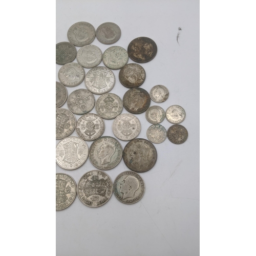 179 - A collection of 1920's/1946 British silver coinage to include half crowns and others, total weight 5... 