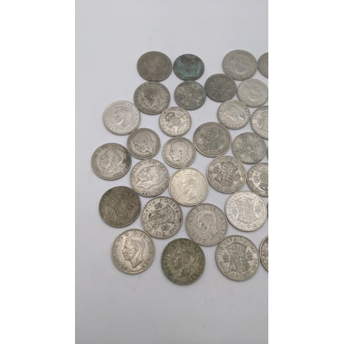 179 - A collection of 1920's/1946 British silver coinage to include half crowns and others, total weight 5... 