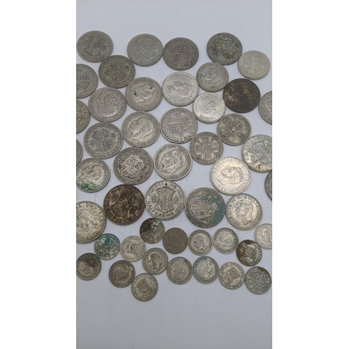 181 - A collection of 1920's/1946 British silver coinage to include Florins, six pence and half crowns, to... 