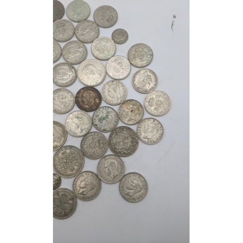 182 - A collection of 1920's/1946 British silver coinage to include florins and others, total weight 503.2... 