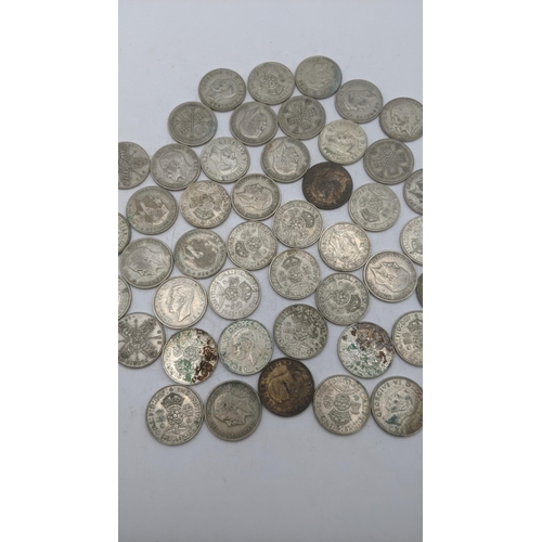 183 - A collection of 1920's/1946 British silver coinage to include two shillings and others, total weight... 