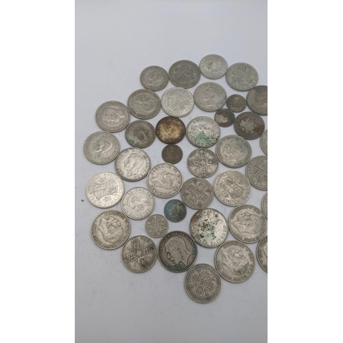 185 - A collection of 1920's/1946 British silver coinage to include Florins and others, total weight 499.1... 