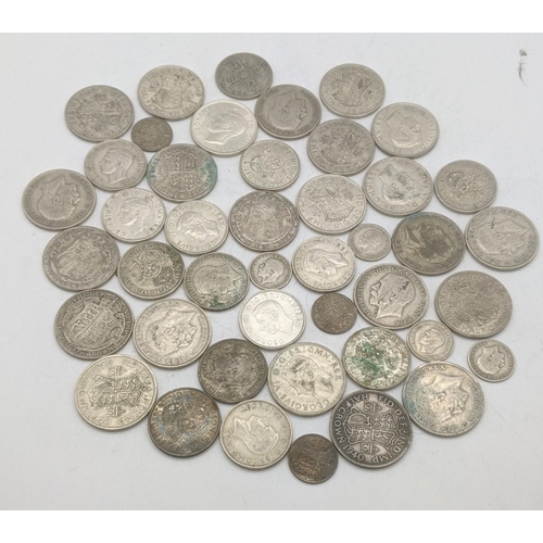 186 - A collection of 1920's/1946 British silver coinage to include six pence and others, total weight 499... 