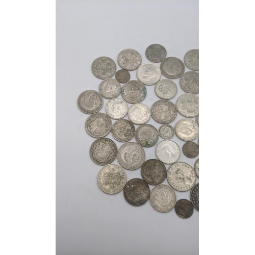 186 - A collection of 1920's/1946 British silver coinage to include six pence and others, total weight 499... 